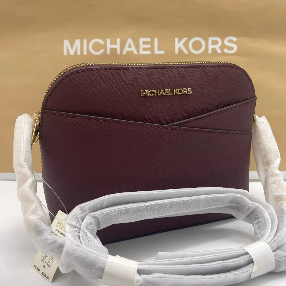 MICHAEL KORS Jet Set Travel Medium Dome Crossbody XCROSS XBODY Bag
Oxblood
NWT - Picture 16 of 16